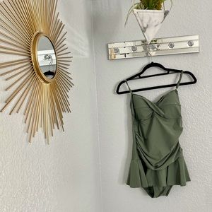 Green One Piece with ruffled skirt size 12